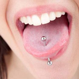 Ganesha Tattoo piercing lengua