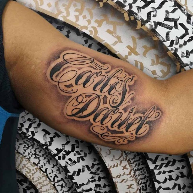 Ganesha Tattoo persona con tattoo lethering